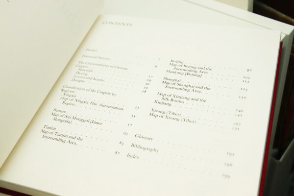 Slip-cased coffee table book "Chinese Carpets" First edition cloth wrapped hardcover in slipcase 1981 Appears unread - Image 7
