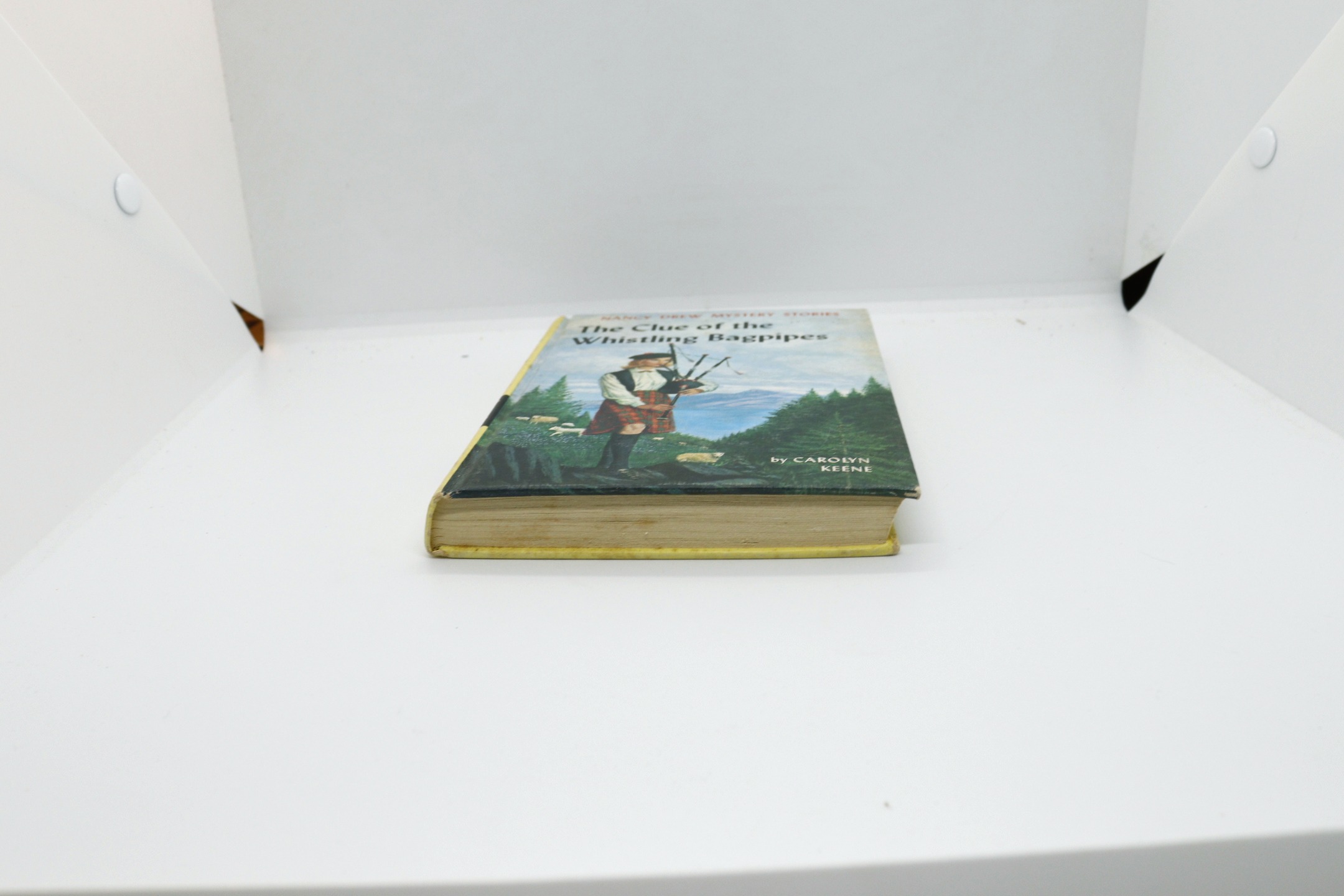 The Clue of the Whistling Bagpipes - Hudson Fine Books