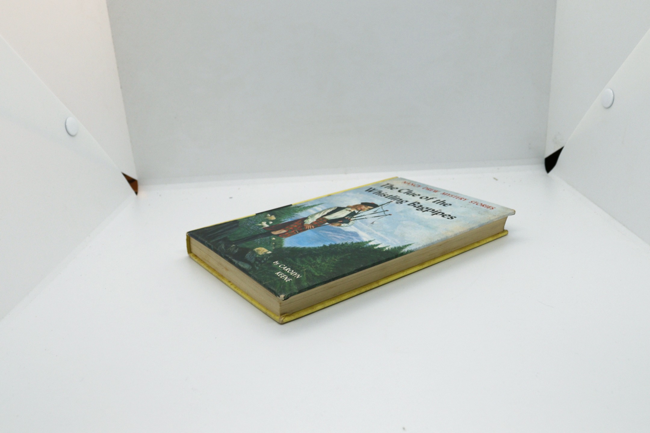 The Clue of the Whistling Bagpipes - Hudson Fine Books