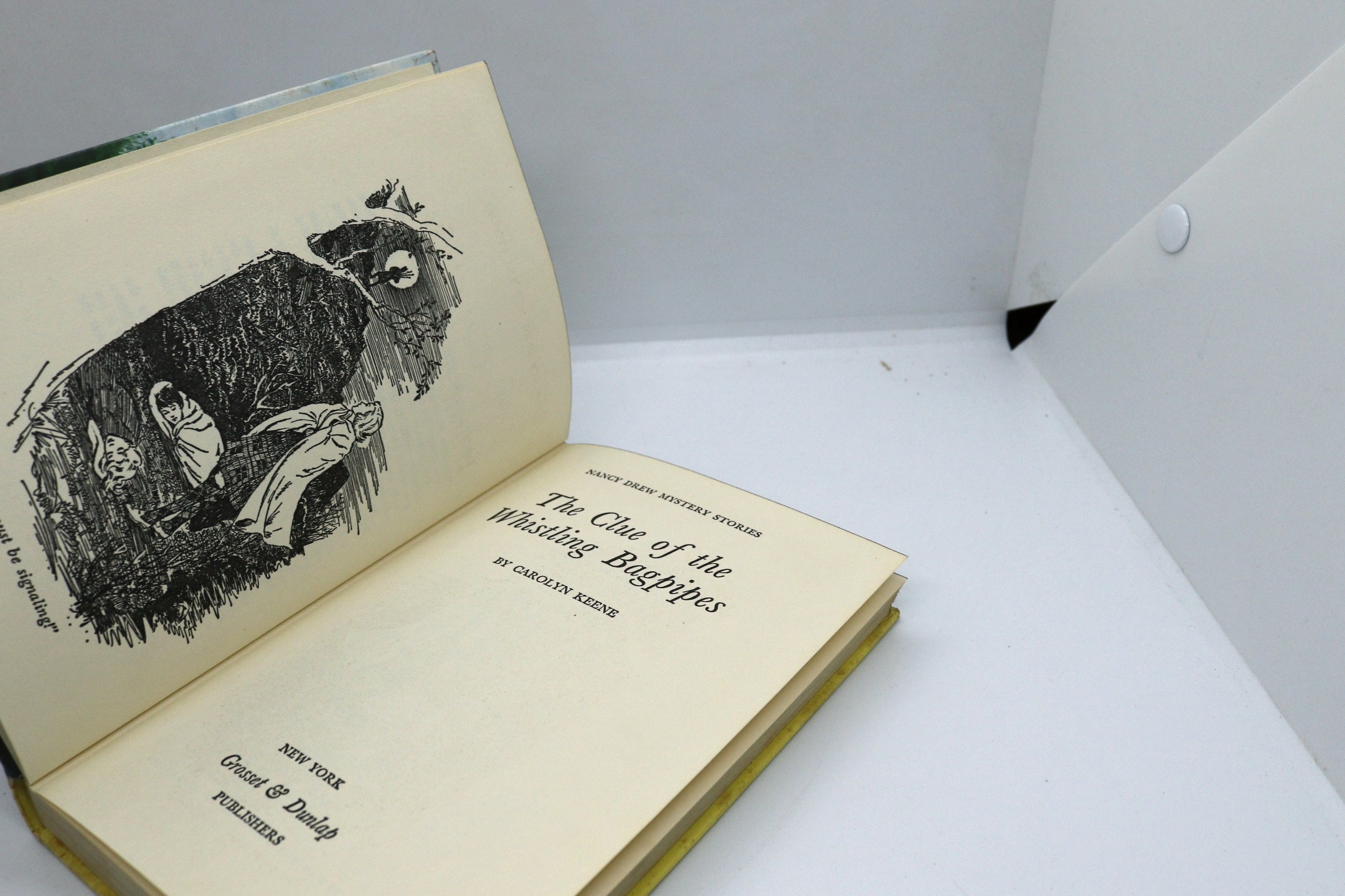 The Clue of the Whistling Bagpipes - Hudson Fine Books